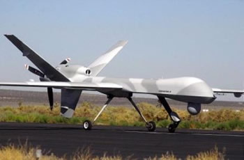 The unmanned Predator B taxis back to a hangar in El Mirage, Calif., in this Sept. 6, 2001 file photo